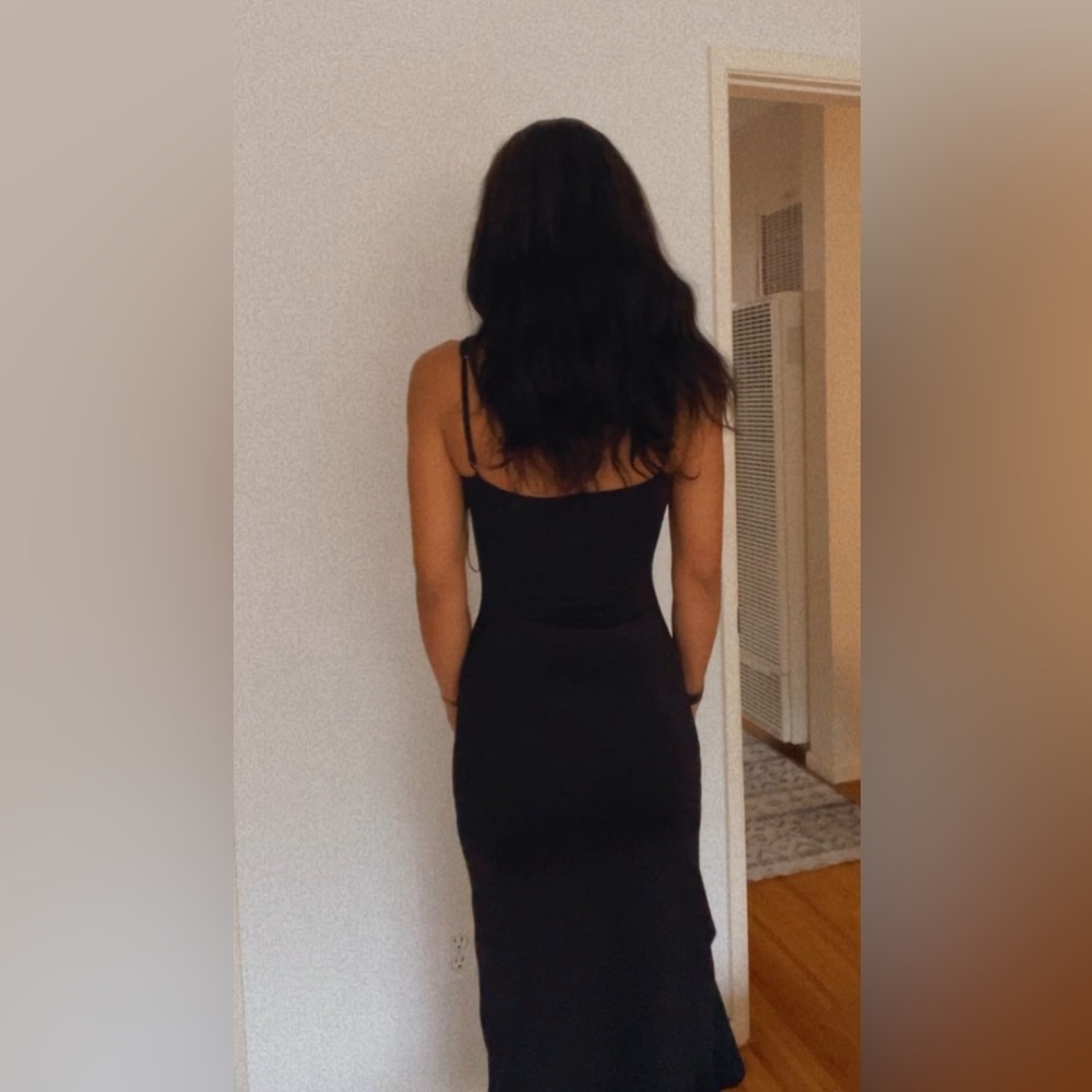 That’s so fetch black midi dress with cut out